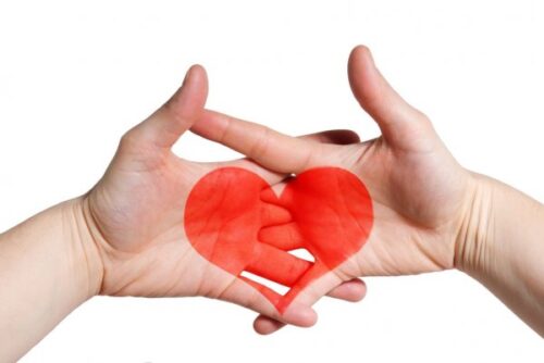 depositphotos  stock photo two hands with a heart
